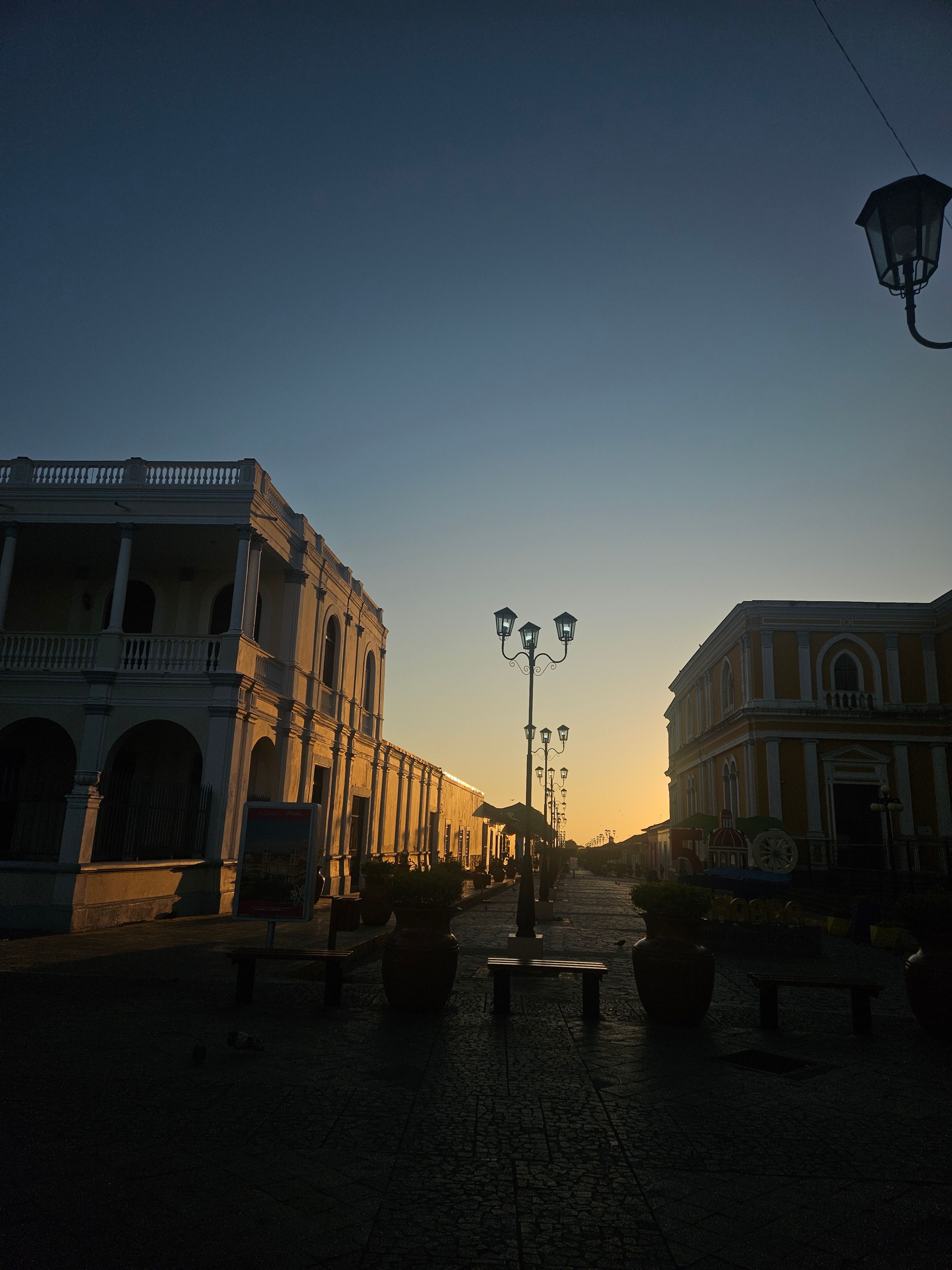 A colonial plaza in the blue light just before sunrise